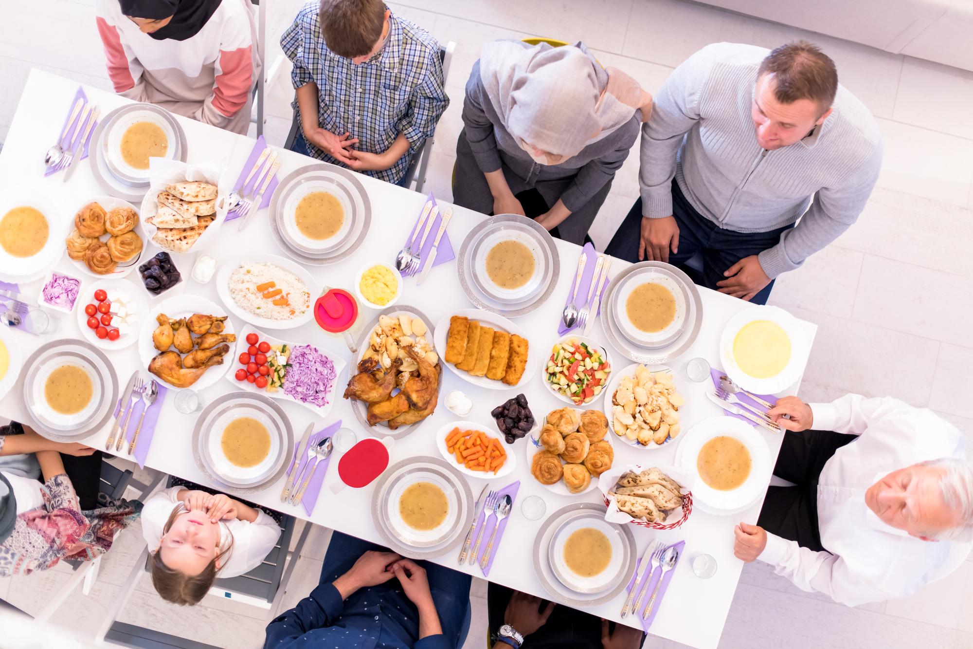Participants tasting dishes at table